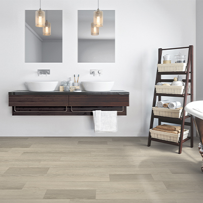 bathroom with grey tile flooring